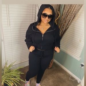 Black and gray sweatsuits available for $30 each!